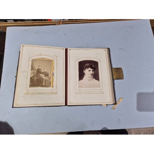 450 - A box of assorted photograph and postcard albums.