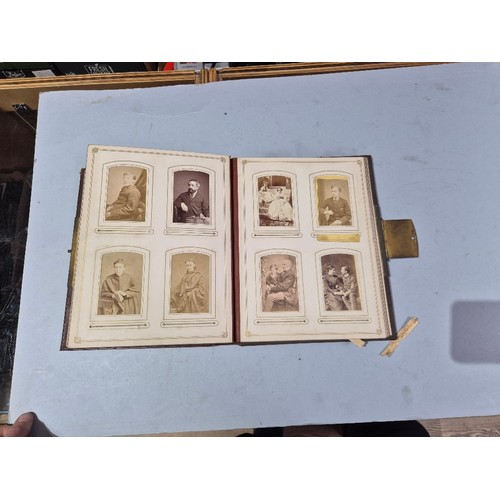 450 - A box of assorted photograph and postcard albums.