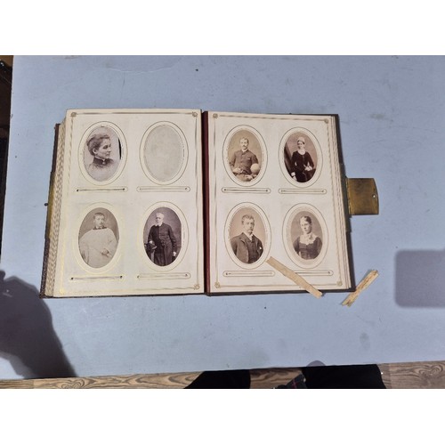 450 - A box of assorted photograph and postcard albums.