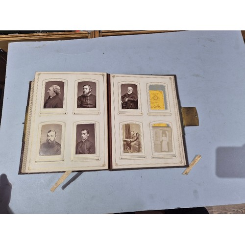 450 - A box of assorted photograph and postcard albums.