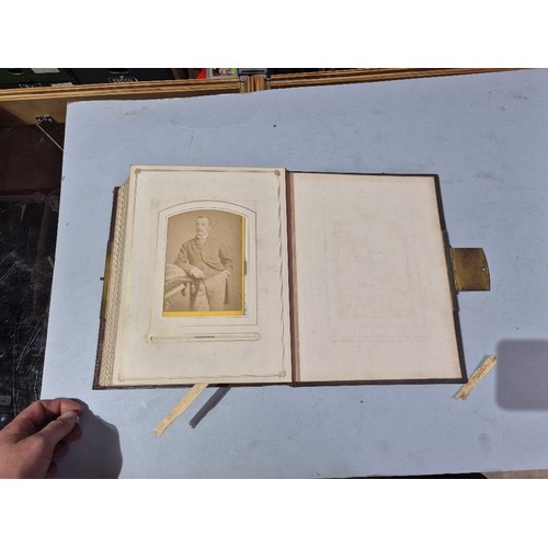 450 - A box of assorted photograph and postcard albums.