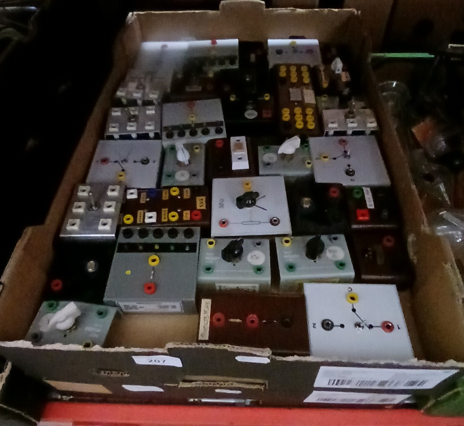 Two boxes of electrical test equipment.