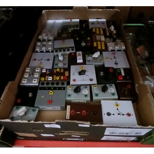 Two boxes of electrical test equipment.