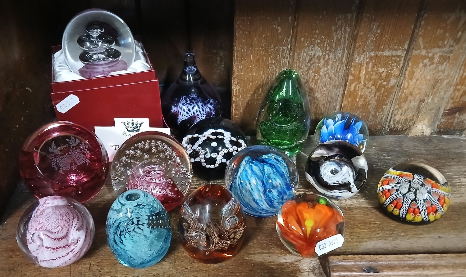 14 glass paperweights including a millefiori and latticino example by ...