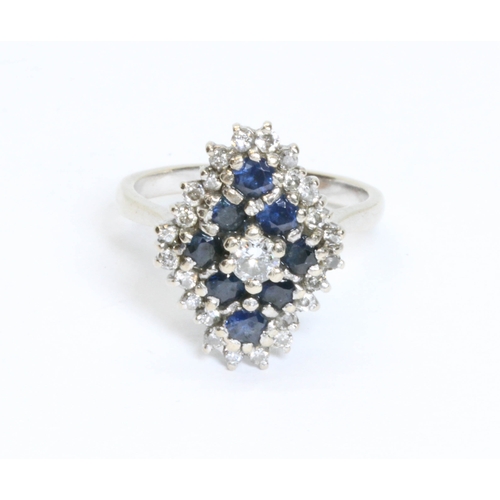 147 - A diamond and sapphire navette shaped cluster ring, 17mm x 13mm, band marked '18ct', gross weight 6.... 