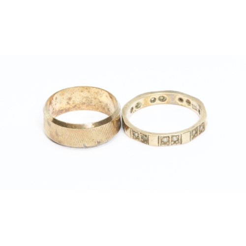 168 - A hallmarked 9ct gold wedding band and an eternity band set with colourless stones marked '9ct', gro... 