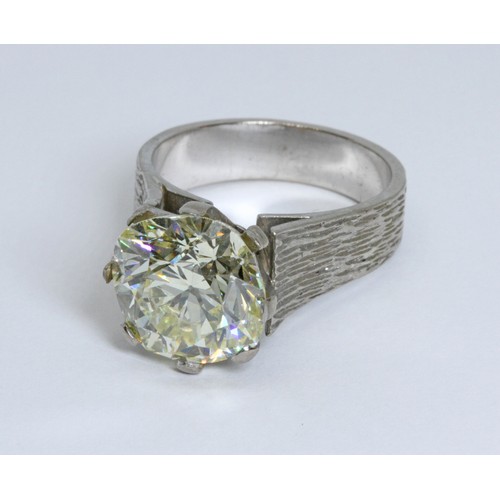 72 - A diamond solitaire ring, the old cut stone weighing approximately 6.35ct, the approximate qualities... 