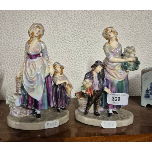329 - A pair of rare Royal Doulton figures London Cry, HN771 and HN772.
