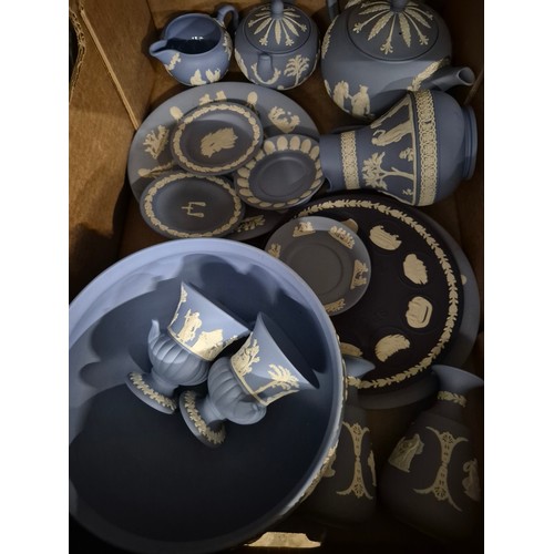314 - A box of assorted blue Wedgwood Jasperware.