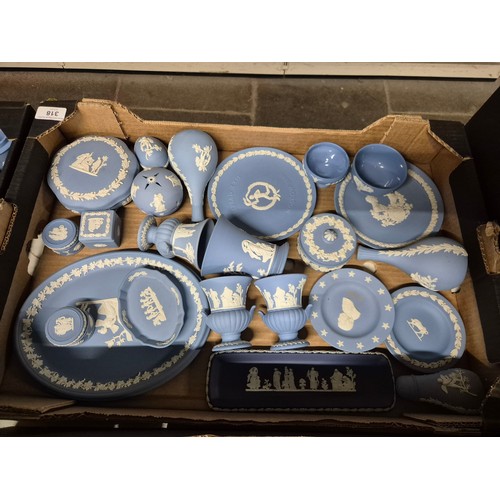 318 - A box of assorted blue Wedgwood Jasperware.