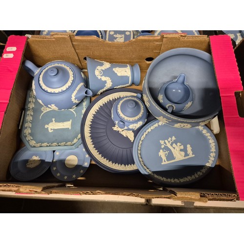 319 - A box of assorted blue Wedgwood Jasperware.