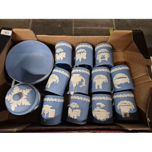 316 - A box of assorted blue Wedgwood Jasperware.