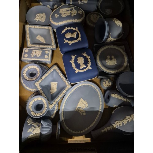310 - A box of assorted blue Wedgwood Jasperware.