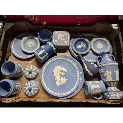 320 - A box of assorted blue Wedgwood Jasperware.