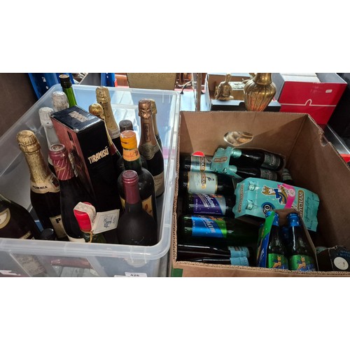 426 - Two boxes of alcoholic beverages including sparkling wine, Babycham, Brandy, Tiramisu et,