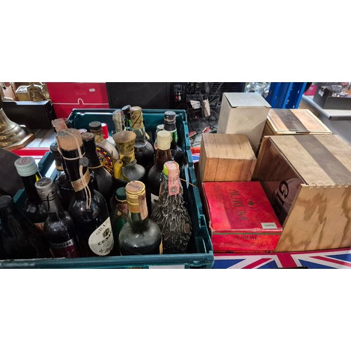 428 - Two boxes of alcoholic beverages including Grappa, Benedictine ,Champagne, Vintage port (1963), etc