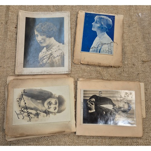 445 - A vintage autograph book with various signed photos etc.