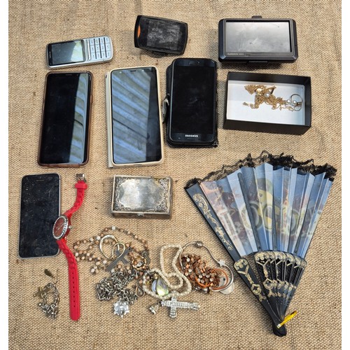 457 - A box of misc. items, costume jewellery, mobile phones, dash cam, sat nav etc.