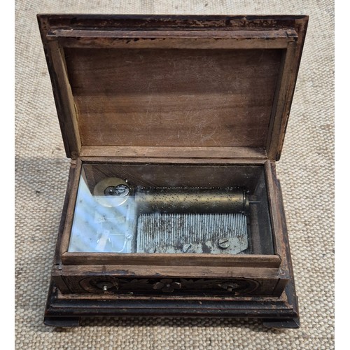 464 - A vintage carved wood music box