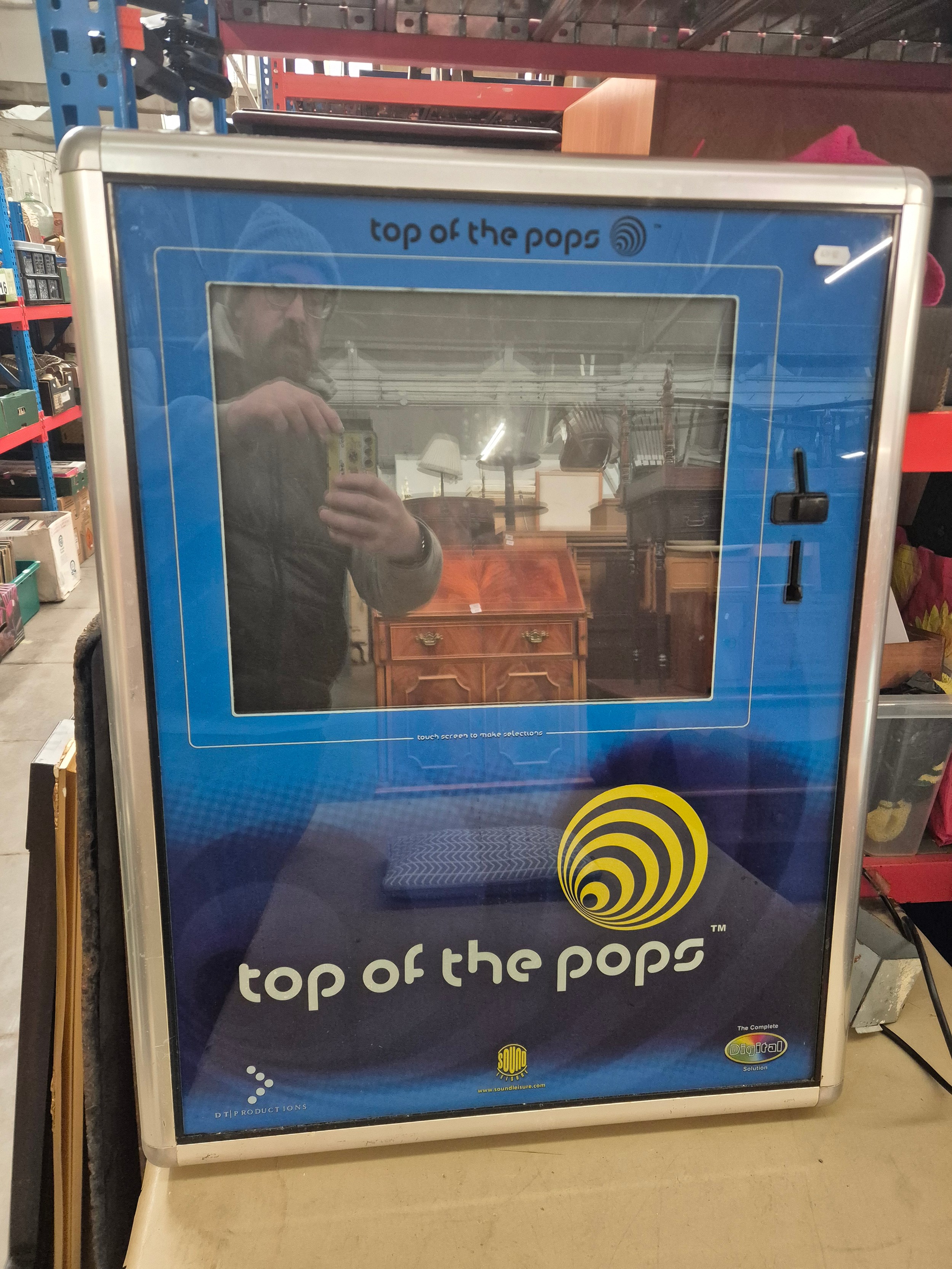 A top of the pops Sound and Leisure digital duke box.