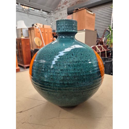 357 - A Poole pottery squat vase by Guy Sydenham