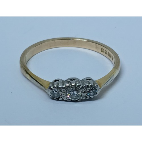 419E - A hallmarked 9ct gold three stone diamond ring, gross weight 2g, size O.
