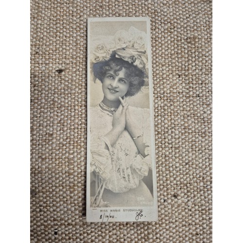 445 - A vintage autograph book with various signed photos etc.