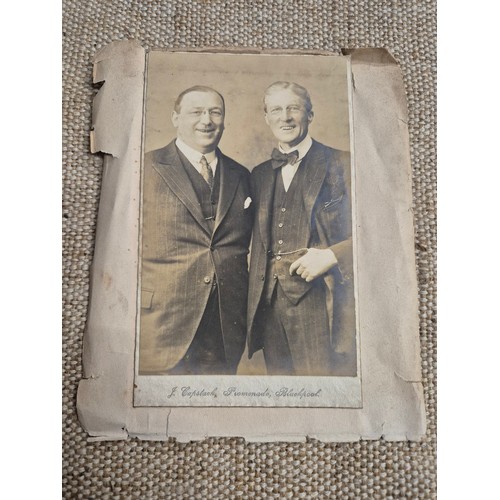 445 - A vintage autograph book with various signed photos etc.