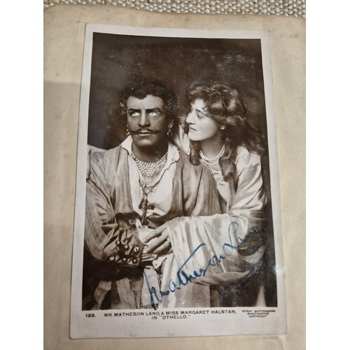 445 - A vintage autograph book with various signed photos etc.