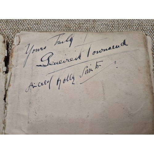 445 - A vintage autograph book with various signed photos etc.