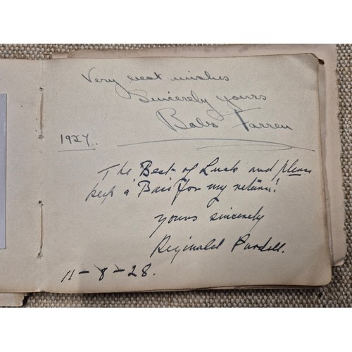 445 - A vintage autograph book with various signed photos etc.