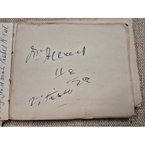 445 - A vintage autograph book with various signed photos etc.