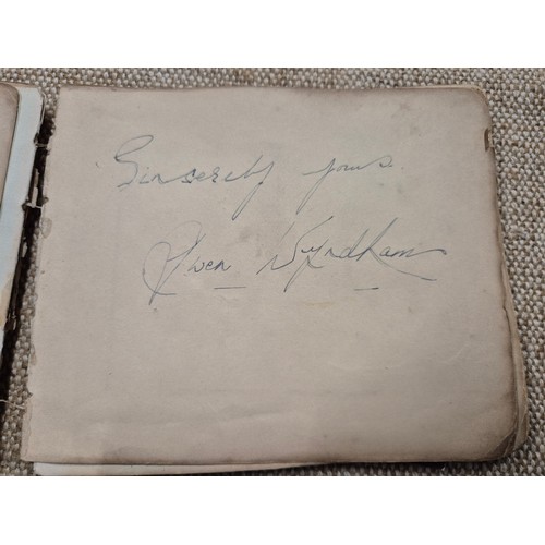 445 - A vintage autograph book with various signed photos etc.