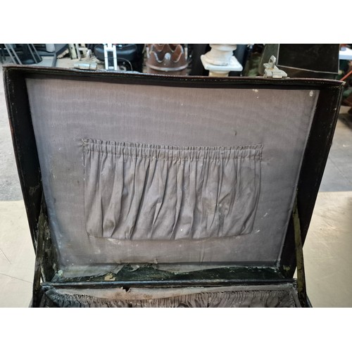 26 - A brown leather case by Drew & Sons, 'to the Royal Family', and a small Gladstone bag