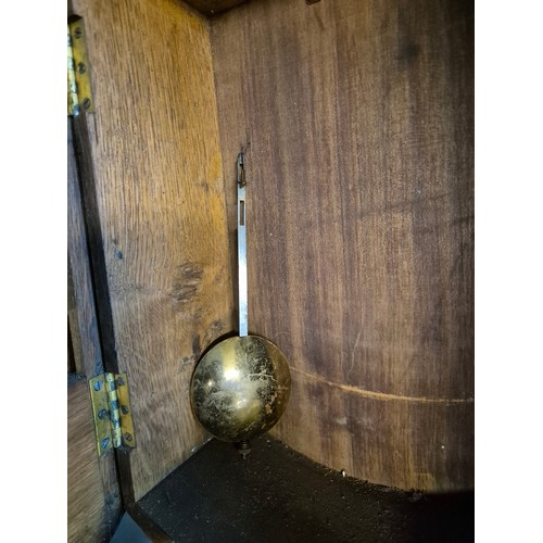 53 - An oak round wall clock, 14