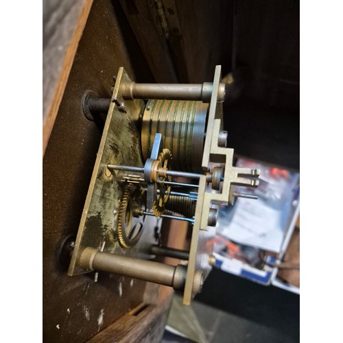 53 - An oak round wall clock, 14