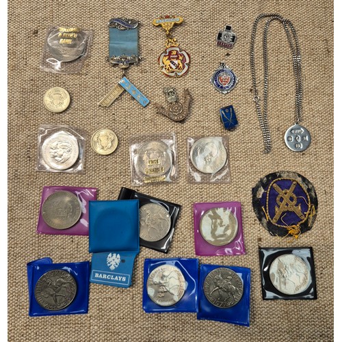 455 - A mixed lot including a hallmarked silver medallion on chain, hallmarked silver medals and assorted ... 