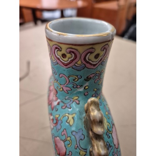 340 - A Chinese porcelain famille rose moon flask, 19th century, height 24.5cm.