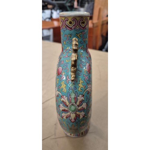 340 - A Chinese porcelain famille rose moon flask, 19th century, height 24.5cm.