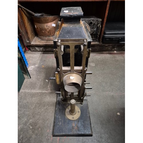 56 - A Tyler  Apparatus Magic Lantern slide projector, a brass coal bucket, and a set of bellows