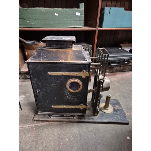 56 - A Tyler  Apparatus Magic Lantern slide projector, a brass coal bucket, and a set of bellows