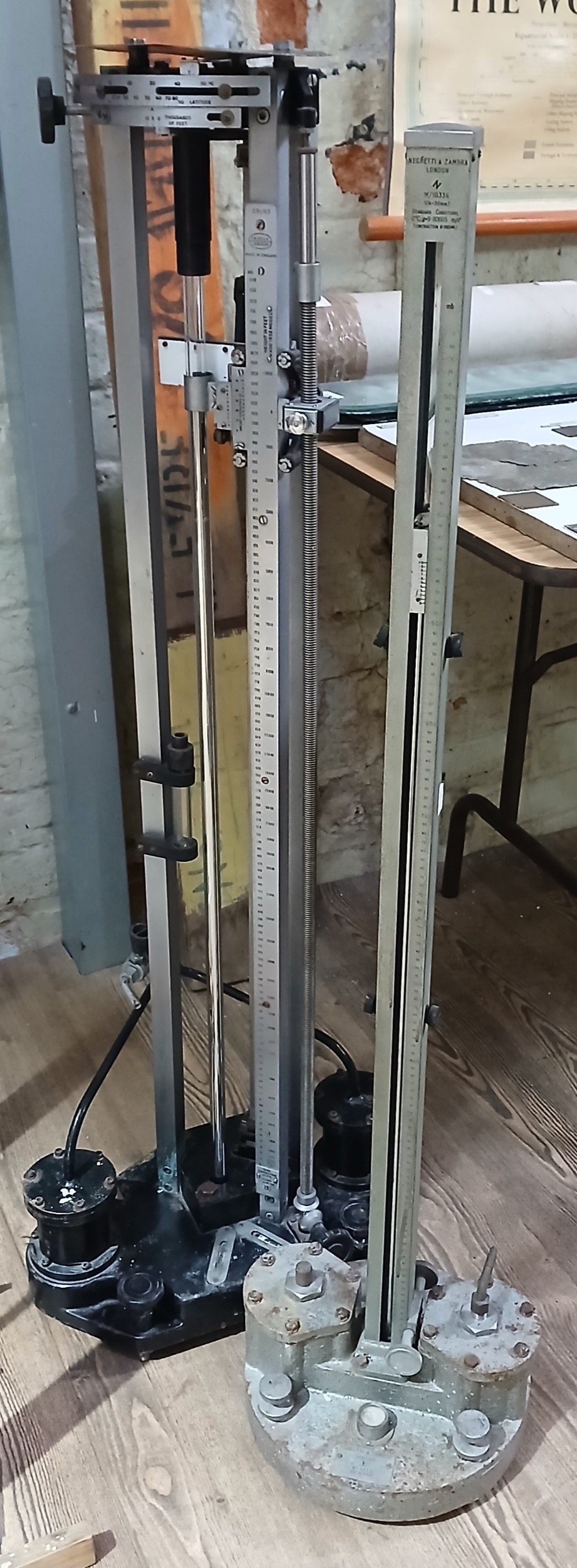 Two laboratory test barometers for calibrating aneroid barometers, one ...