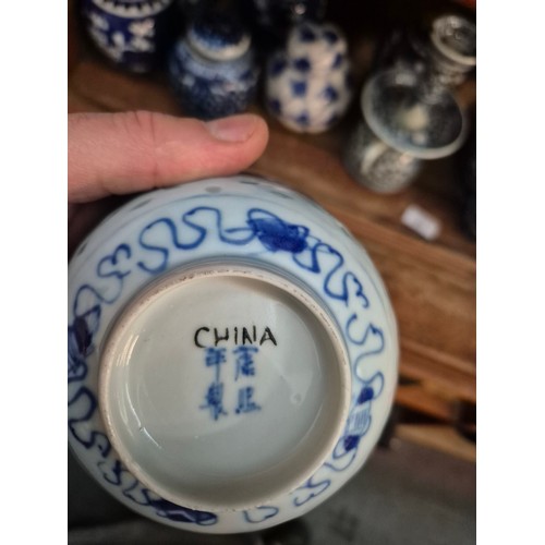 31 - A collection of blue and white oriental ceramics