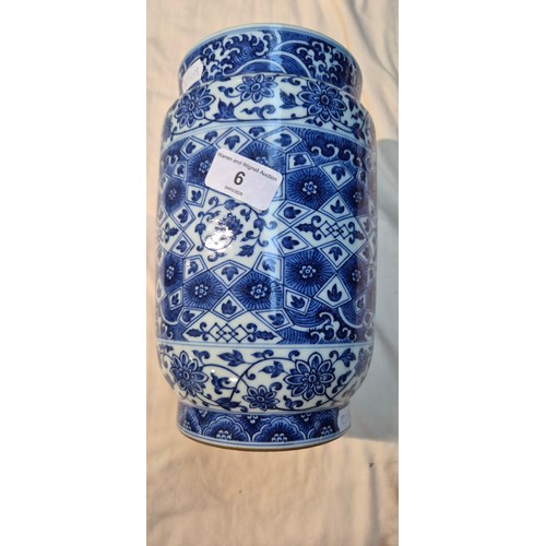 6 - A Chinese blue & white vase decorated with geometric patterns, 23cm in height.