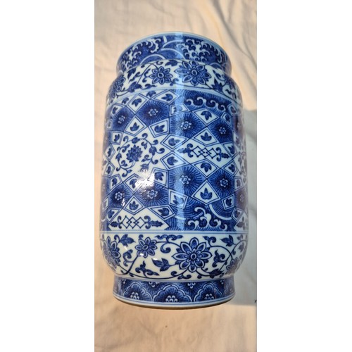 6 - A Chinese blue & white vase decorated with geometric patterns, 23cm in height.