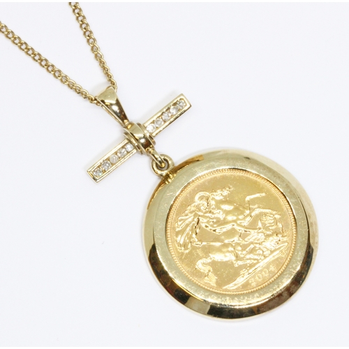 1 - A hallmarked 9ct gold mounted Elizabeth II 2004 half sovereign diamond pendant, length 40mm, suspend... 