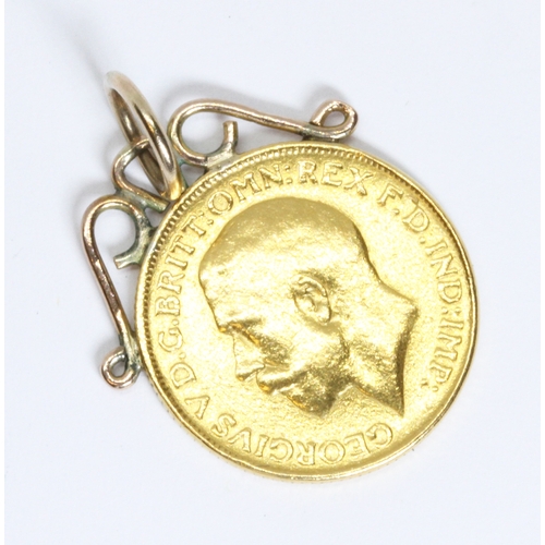 12 - A George V 1911 sovereign, yellow metal pendant mount, gross weight 8.6g.
