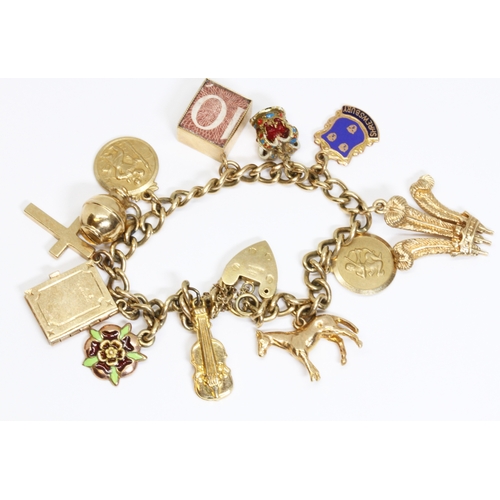 123 - A hallmarked 9ct gold charm bracelet, gross weight 37g, 10% buyer's premium (inclusive of VAT), norm... 