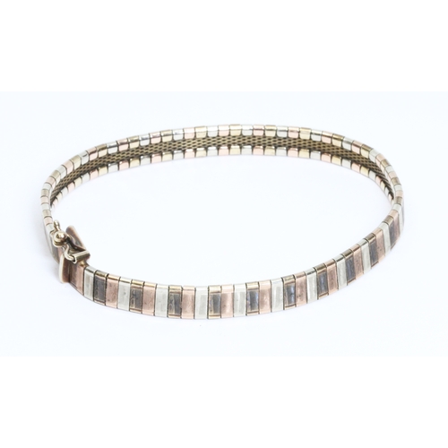 135 - A three colour bracelet, marked '375', length 18cm, weight 13.5g, 10% buyer's premium (inclusive of ... 