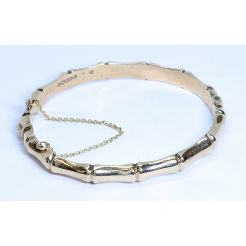 137 - A 9ct gold bamboo effect bangle, 6cm x 5.5cm, weight 9.9g, 10% buyer's premium (inclusive of VAT), n... 